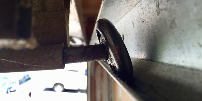 garage door wheel off track repair